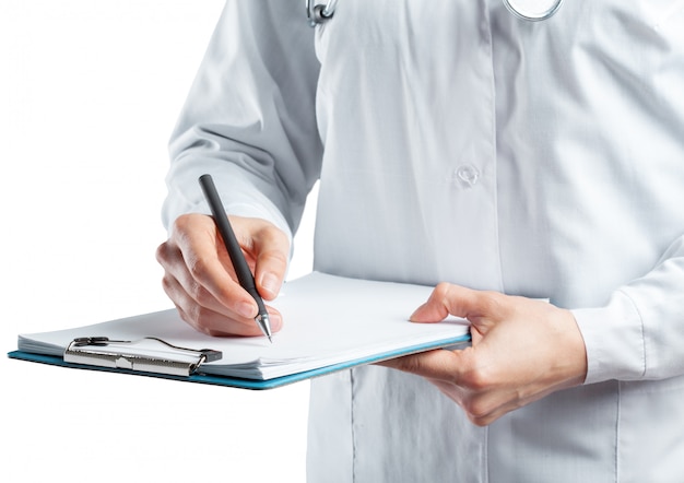 Female doctor in uniform holding clipboard