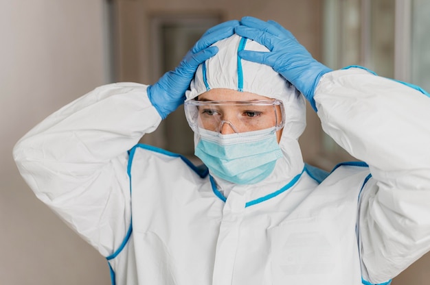 Female doctor wearing protective equipment