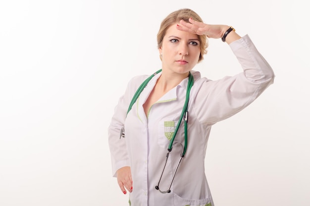 Female doctor on a white background with a phonendoscope