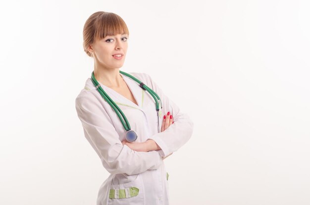 Female doctor on a white background with a phonendoscope