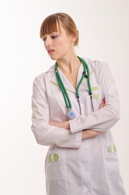 Female doctor on a white background with a phonendoscope