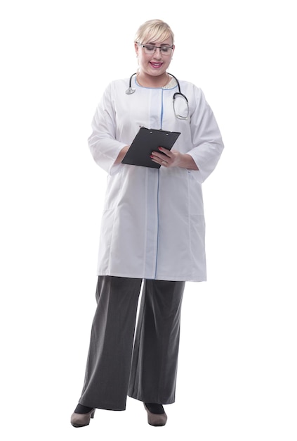 Female doctor with clipboard looking at camera