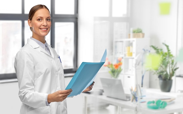 female doctor with folder at hospital