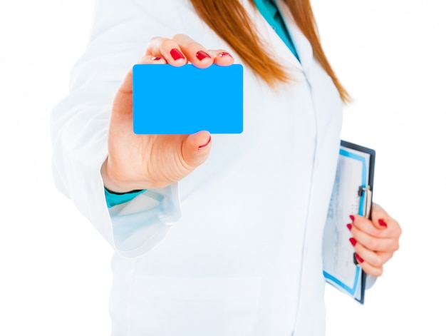 Female doctor with gives card to patient