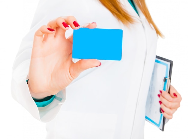 Female doctor with gives card to patient