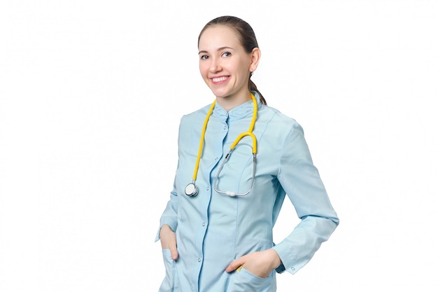 Female doctor with a stethoscope on a white.