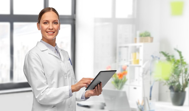 female doctor with tablet computer at hospital