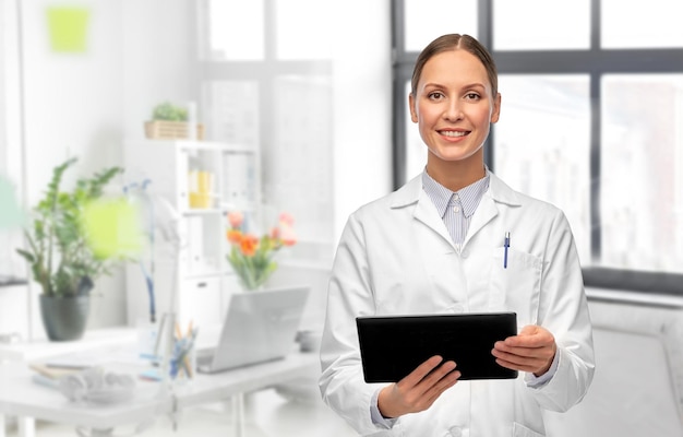 female doctor with tablet computer at hospital