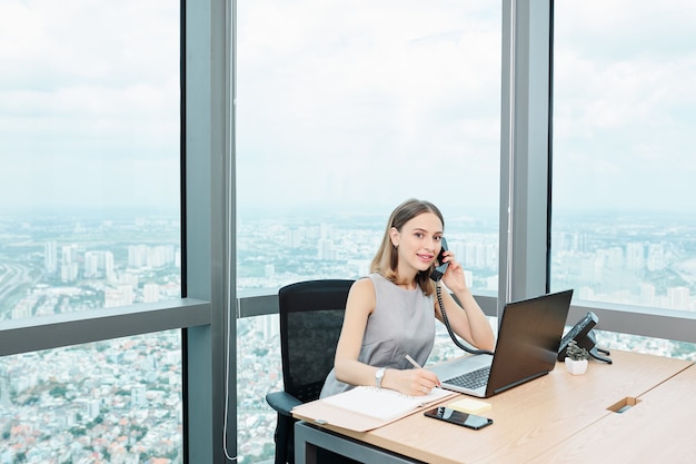 Female entrepreneur talking on phone