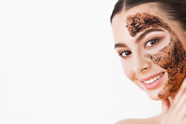 Female face with perfect skin and chocolate mask