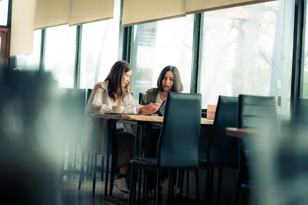 Female freelancers discuss new content created for the perfect project