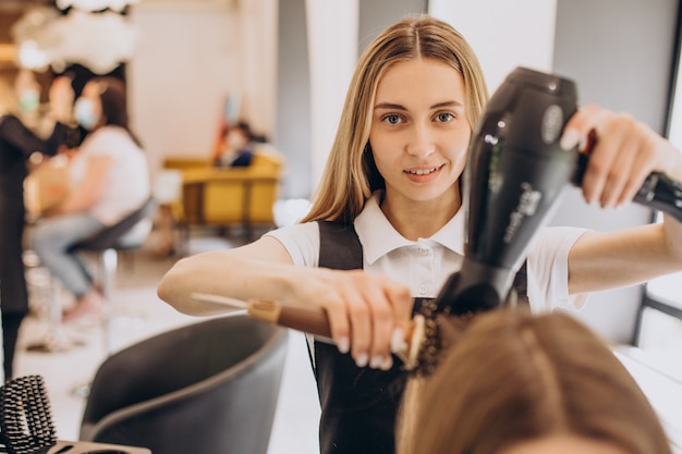 Female hairdresser in a beauty salon