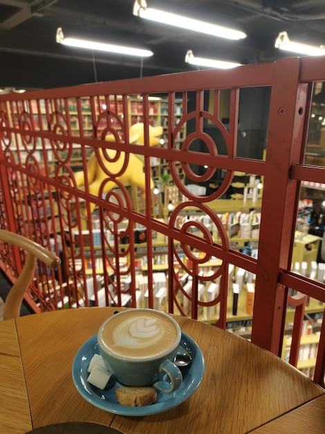 Female hand and cup of coffee in creative coffee shop st petersburg Russian coffee shops Russian architecture aesthetics of relaxation coffee and petersburg