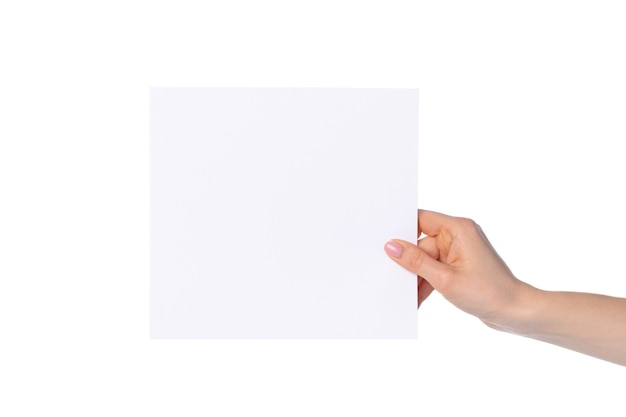 female hand holding blank paper page