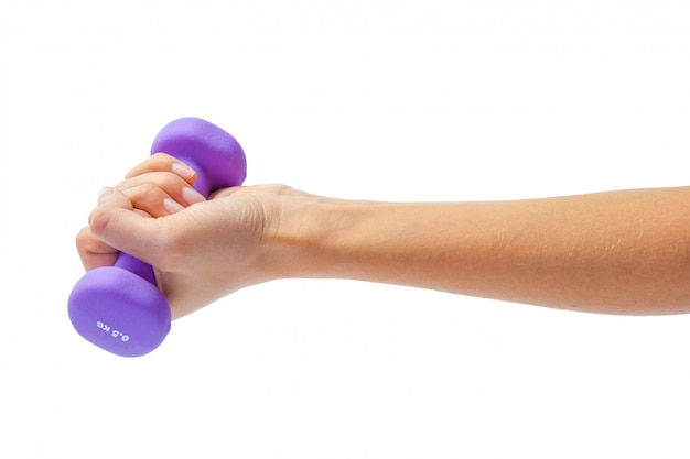 Female hand holding a dumbbell isolated on white