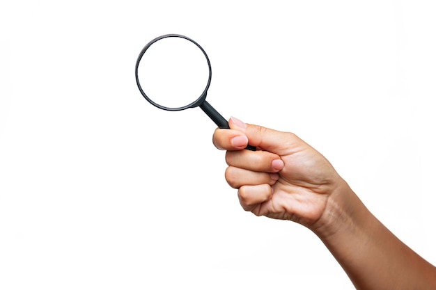 Female hand holding a magnifying glass isolated on a white background. Mockup with empty copy space