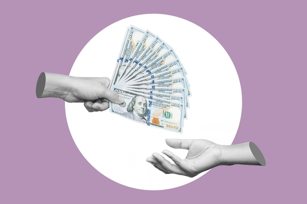 Female hand holding wad of hundred-dollar cash bills passing it on to another person on purple color