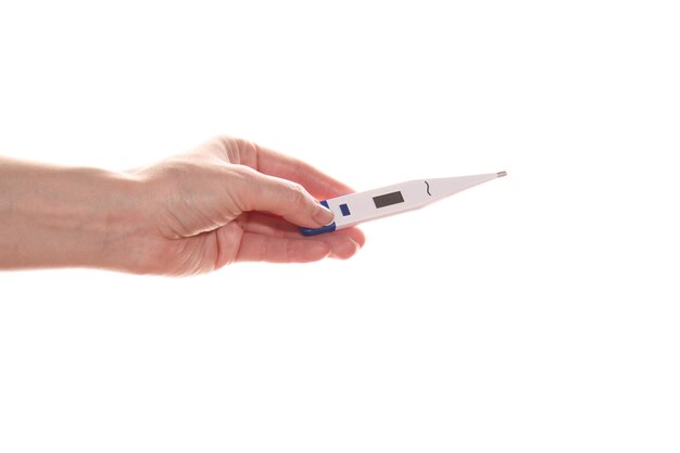 Female hand holds a thermometer The virus the common cold Isolated on a white background