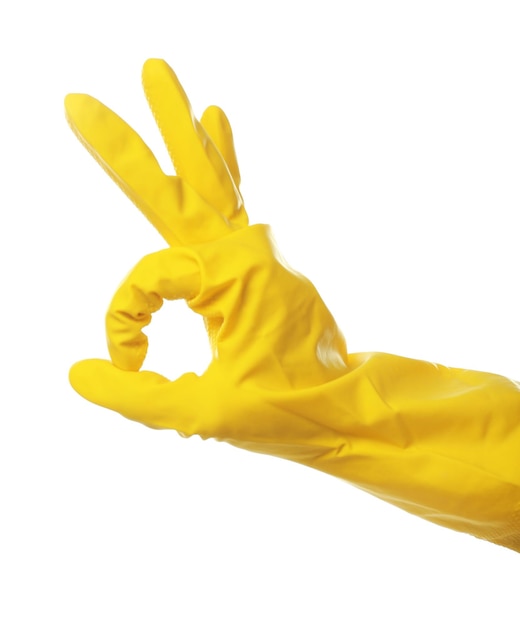 Female hand in rubber glove showing OK sign isolated on white