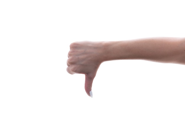 Female hand showing a thumb down gesture, Isolated.