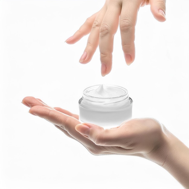 Female hand with bottle of cream on white background