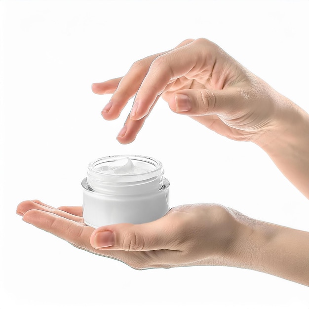 Female hand with bottle of cream on white background