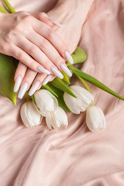 Female hand with spring nail design