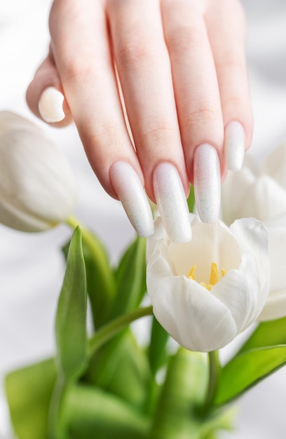 Female hand with spring nail design