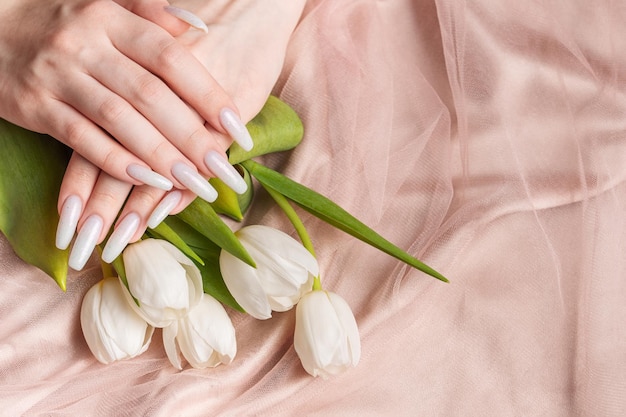 Female hand with spring nail design