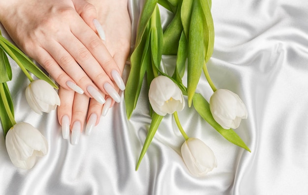 Female hand with spring nail design