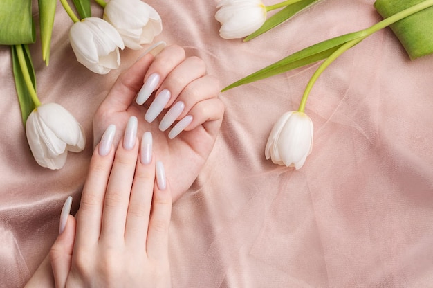 Female hand with spring nail design