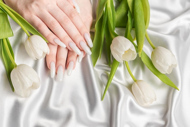 Female hand with spring nail design