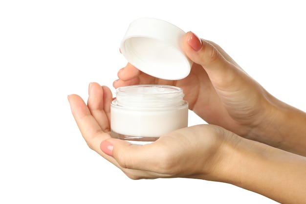 Female hands hold jar with cosmetic cream