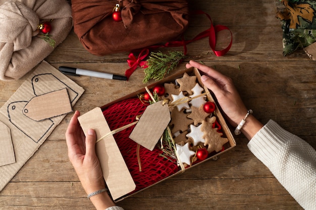 Female hands holding eco-friendly packaged gift