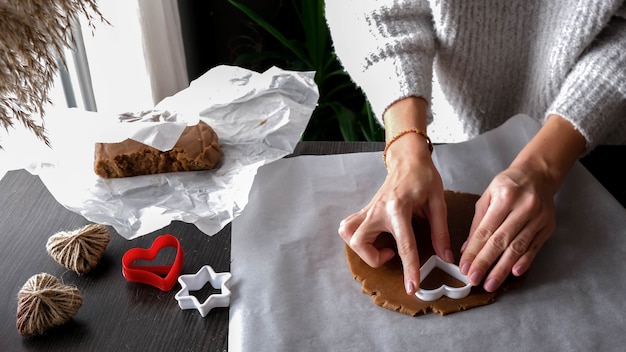 Female hands making dough cake. making a cake at home, handmade, homemade. recipe, step by step. Do it yourself gift for valentines day
