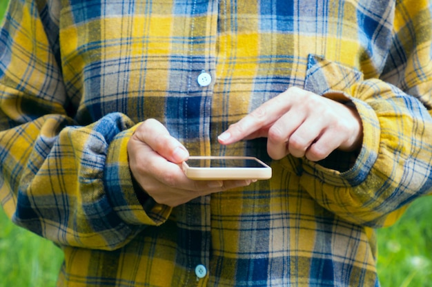 Female hands with phone closeup