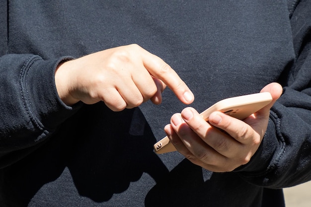 Female hands with phone closeup