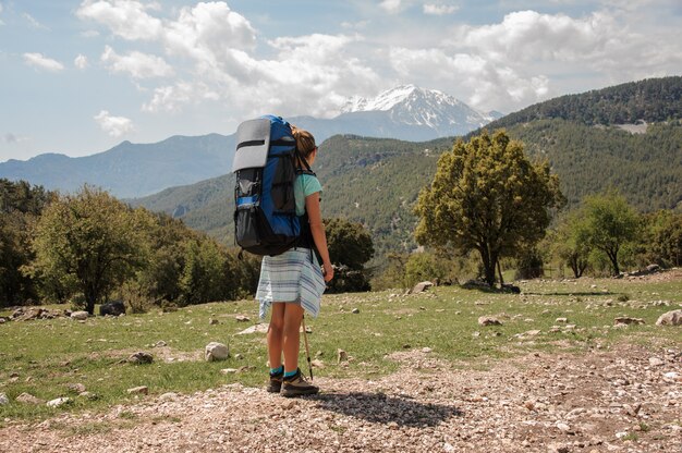 Female hiker looking at Takhtalydag mountain in Turkey