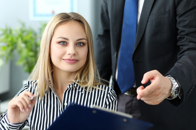 Female manager helps develop company strategy.