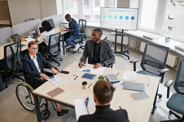 Female Manager using Wheelchair in Meeting