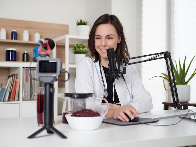 Female nutritionist talking about hibiscus drink infusion tea