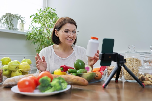 Female nutritionist telling her followers about healthy food nutritional supplements