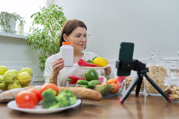 Female nutritionist telling her followers about healthy food nutritional supplements