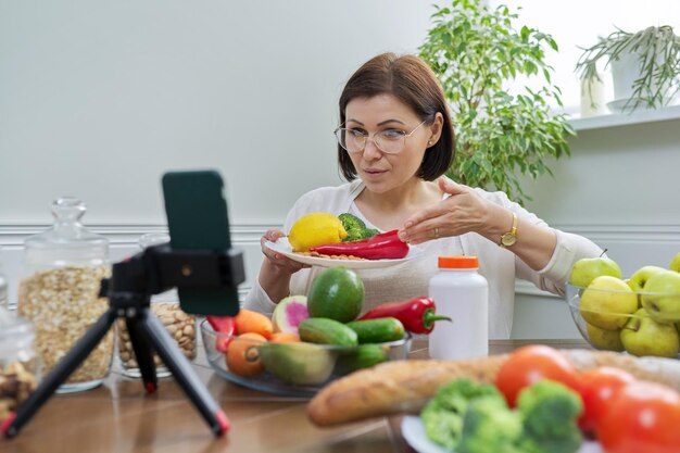 Female nutritionist telling her followers about healthy food nutritional supplements