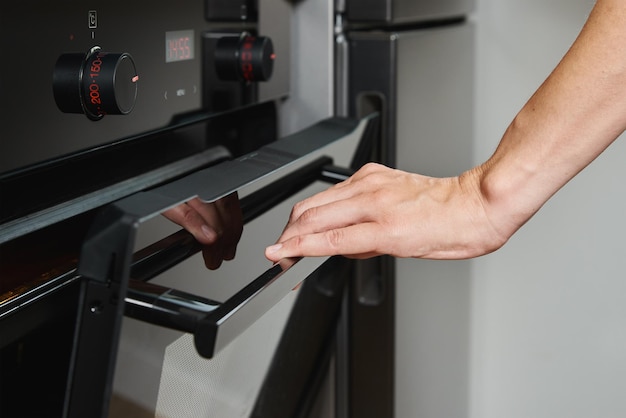 Female open electric oven door