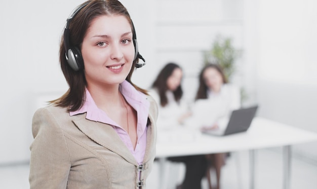 Female operator call center in the background of the office