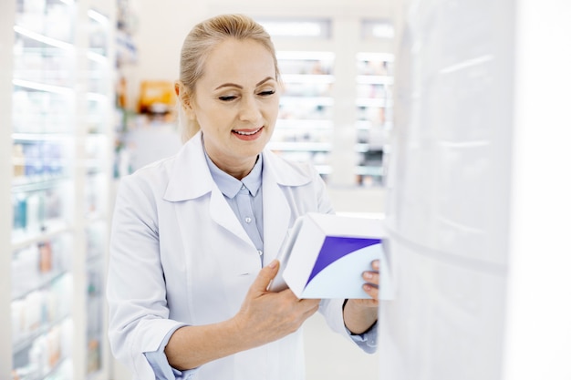 Female pharmacist working in a drugstore