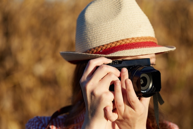 Female photographer in the country