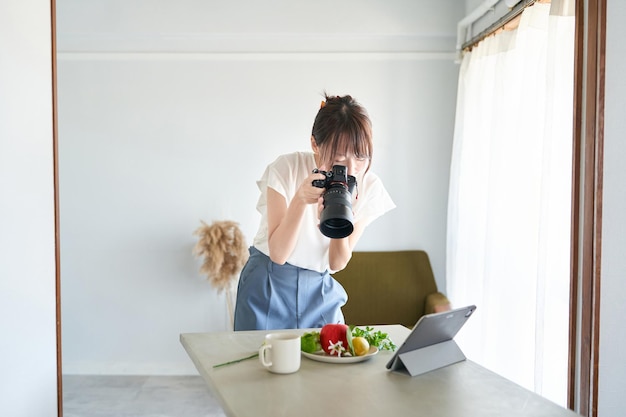 Female photographer in the room