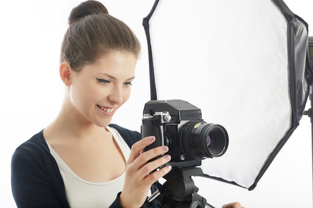 female photographer working in studio